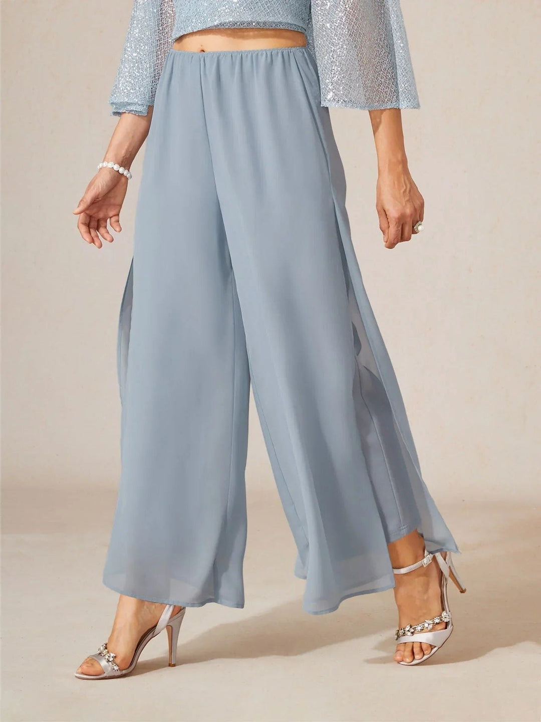 Women's sophisticated overlay wide leg trousers, perfect for creating an elegant, layered outfit.