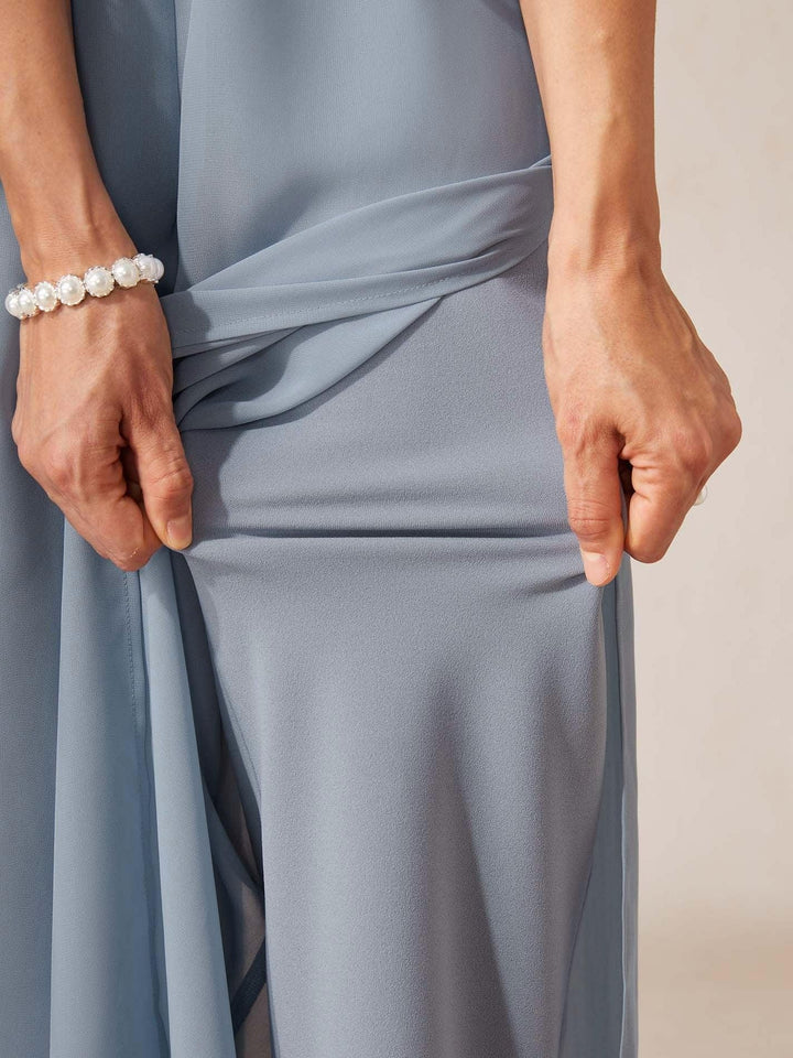 Stylish women's wide leg pants with an elegant overlay and tie waist, great for evening or casual.