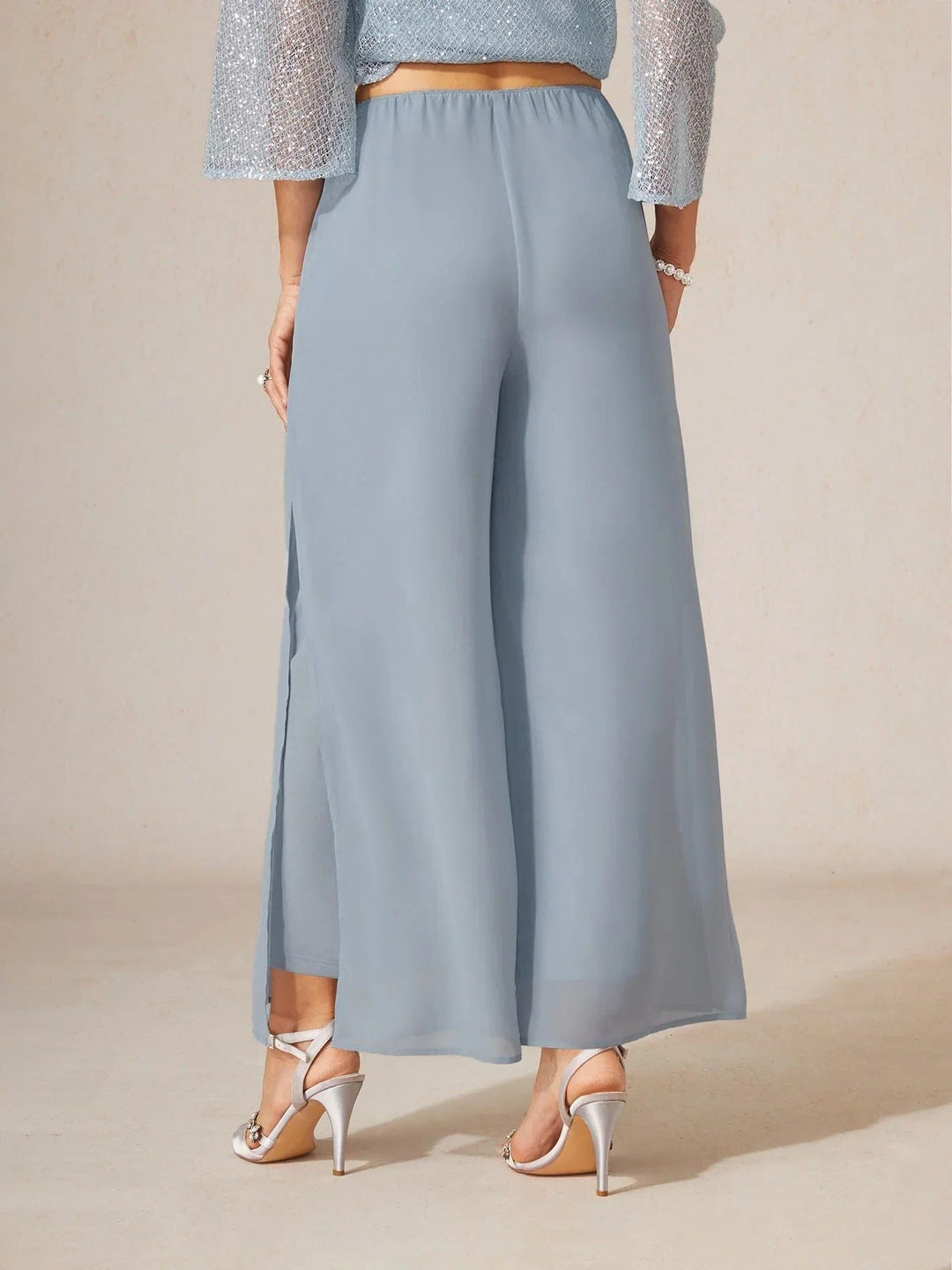 Elegant women's flowy wide leg pants with overlay; a perfect blend of comfort and style.