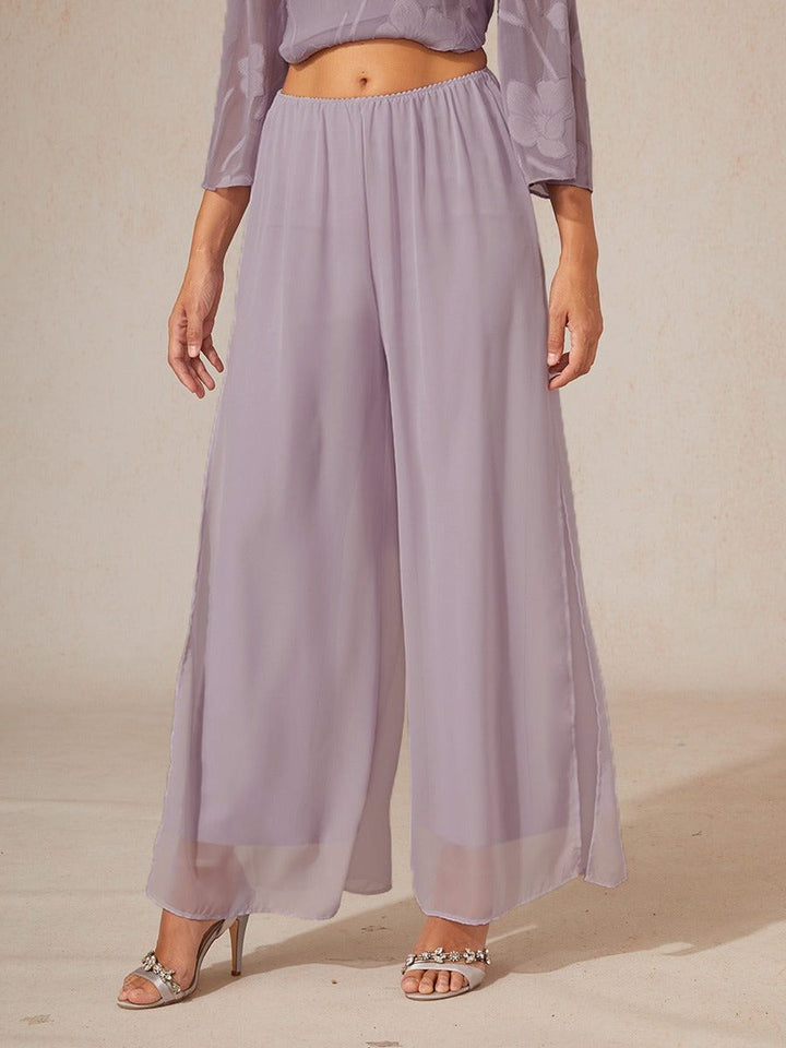 Women's elegant wide leg pants with a unique overlay design and tie waist for a flattering fit.