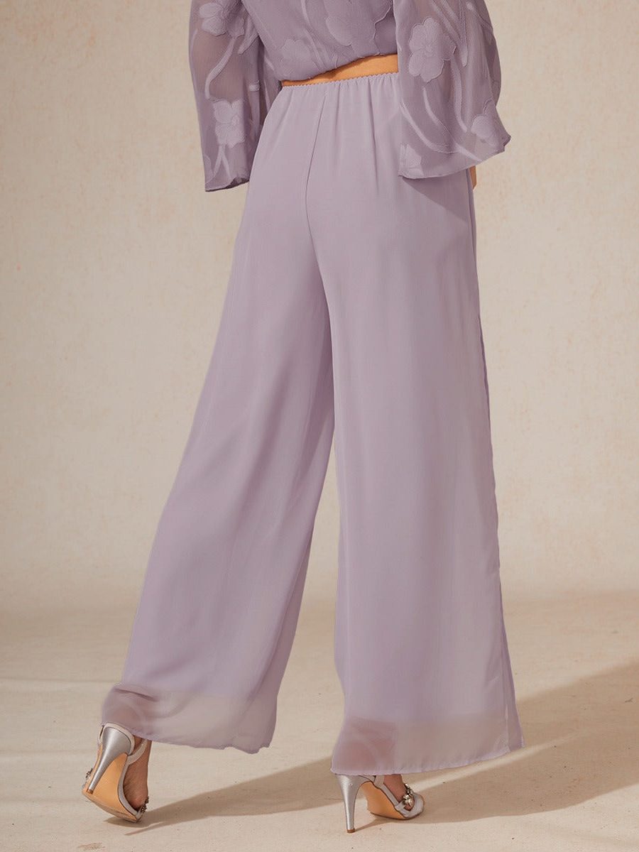 Sophisticated women's flowy wide leg trousers with a layered overlay, ideal for evening wear.