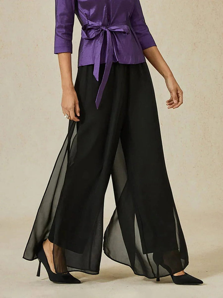 Chic women's elegant wide leg pants with overlay detail and a flattering tie waist.
