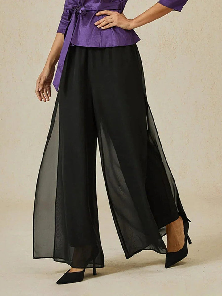 Women's sophisticated wide leg overlay trousers, ideal for evening events or upscale casual.