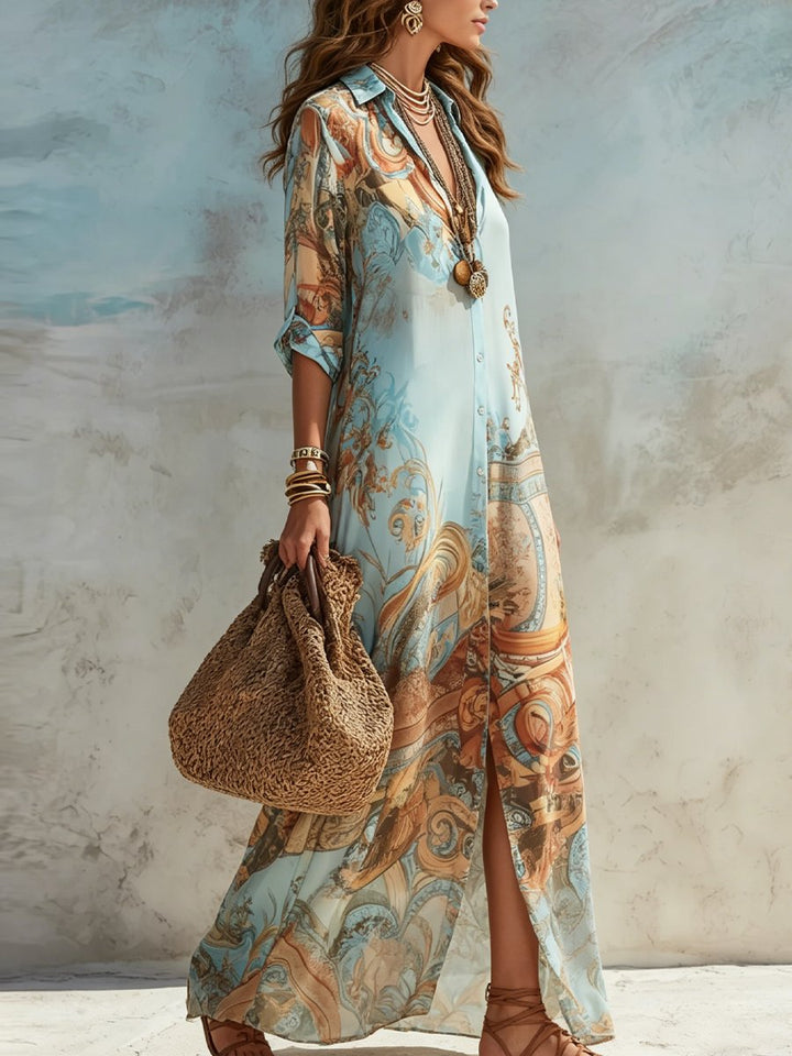 Flowy women's paisley print maxi dress with a full button-through front. Ideal printed shirt dress for summer holidays.