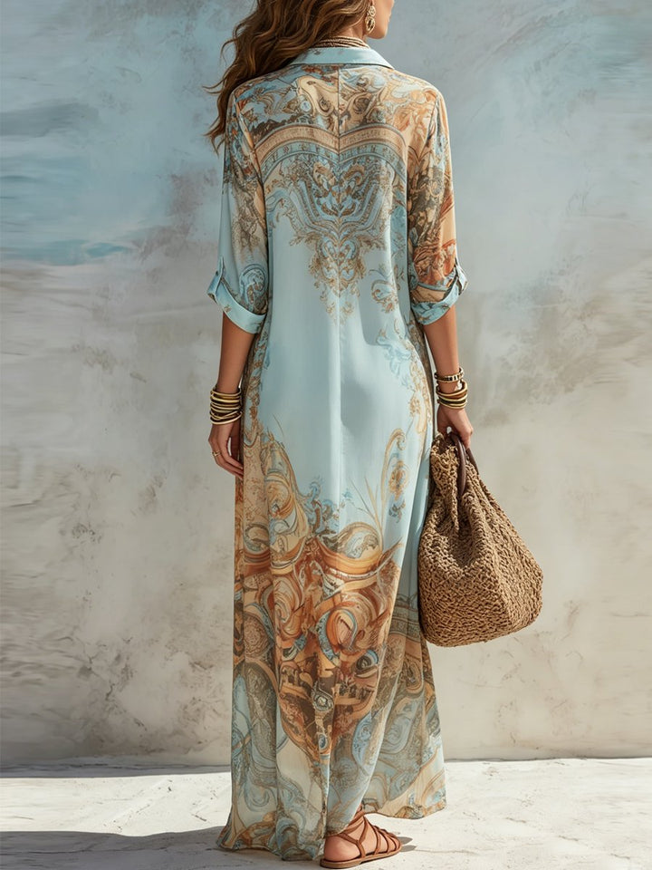 Vibrant women's paisley print long maxi shirt dress, features button-through design. Perfect for summer and beach.