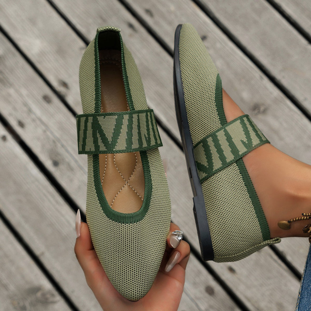 Ladies' elegant patterned ballet flats, featuring a sophisticated pointed toe, essential for chic footwear.