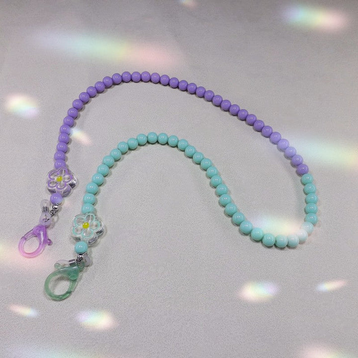 Chic pearl & bead eyeglass holder chain, a trendy accessory and practical gift for women's glasses.