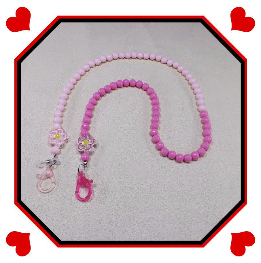 Vibrant beaded and pearl glasses chain, an elegant and secure women's eyewear holder accessory.