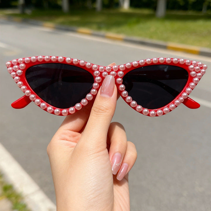 Elegant women's pearl cat eye sunglasses, offering stylish UV protection eyewear for summer.