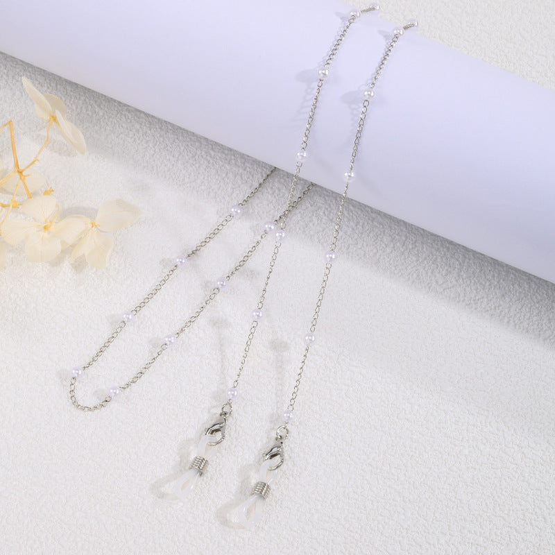 Delicate white pearl chain necklace for women, an elegant fashion accessory with classic style, ideal pearl jewelry.