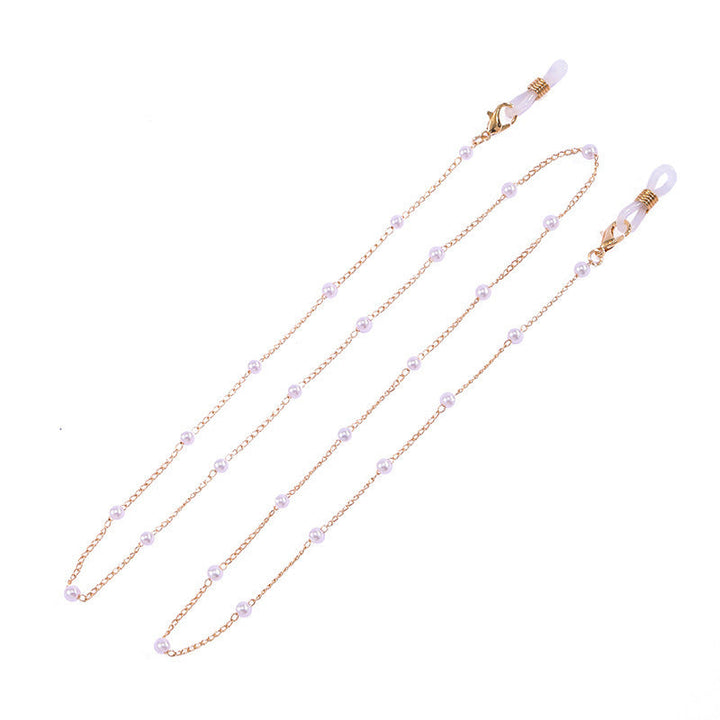 Women's elegant pearl chain necklace, a classic and delicate fashion accessory, featuring white or gold pearl options.