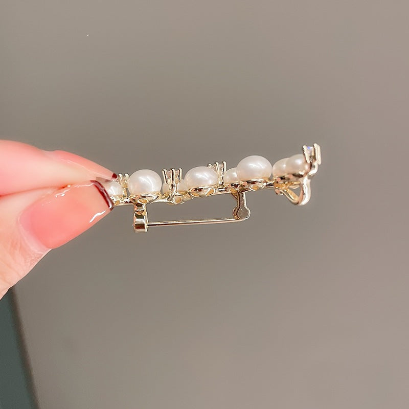 Timeless elegant pearl drop earrings, perfect for women's special occasions or sophisticated everyday wear.