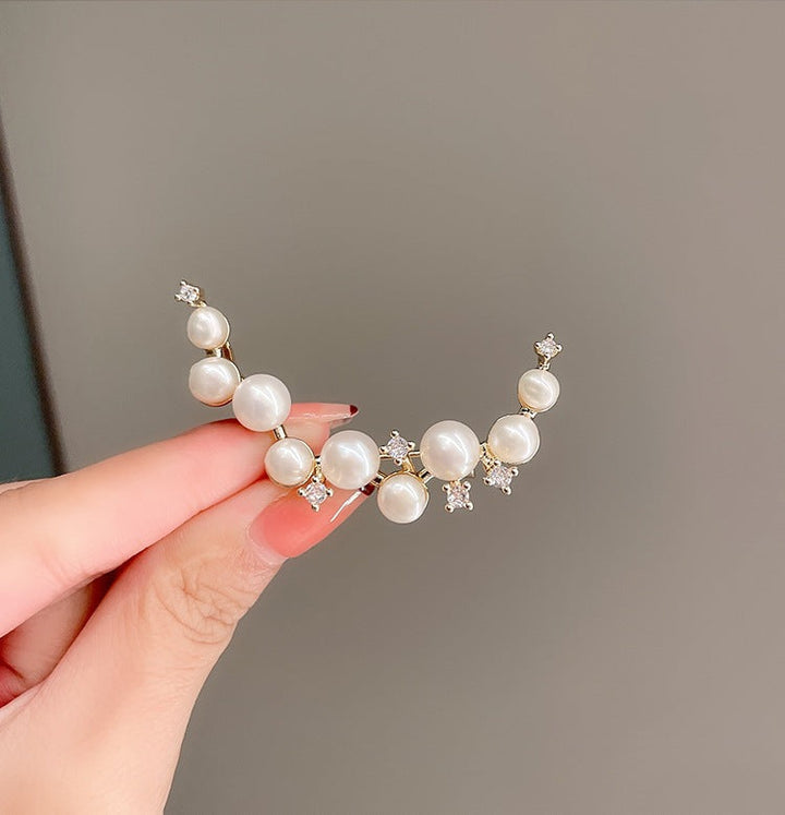 Classic women's pearl drop earrings, a stunning piece of elegant fashion jewelry, ideal for gifting.