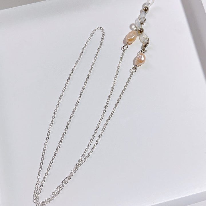 Women's elegant pearl chain with gold/silver accents, perfect as a fashion jewelry holder or eyeglass chain.