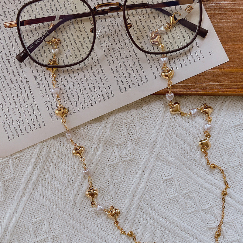 Beautiful women's pearl necklace with gold accents, an elegant gift for her or any special occasion.