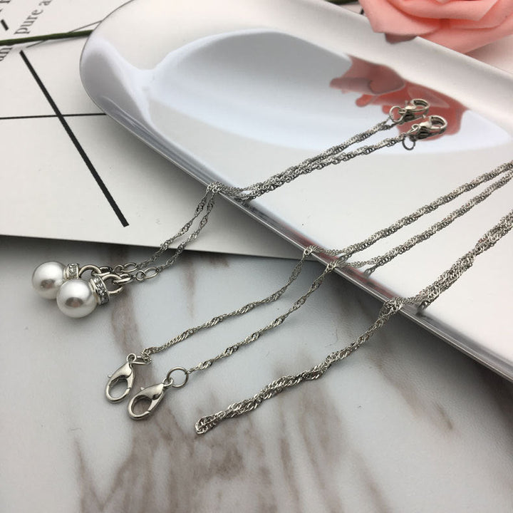 Delicate pearl pendant necklace for women. Adjustable silver & gold chain makes it a versatile fashion accessory.