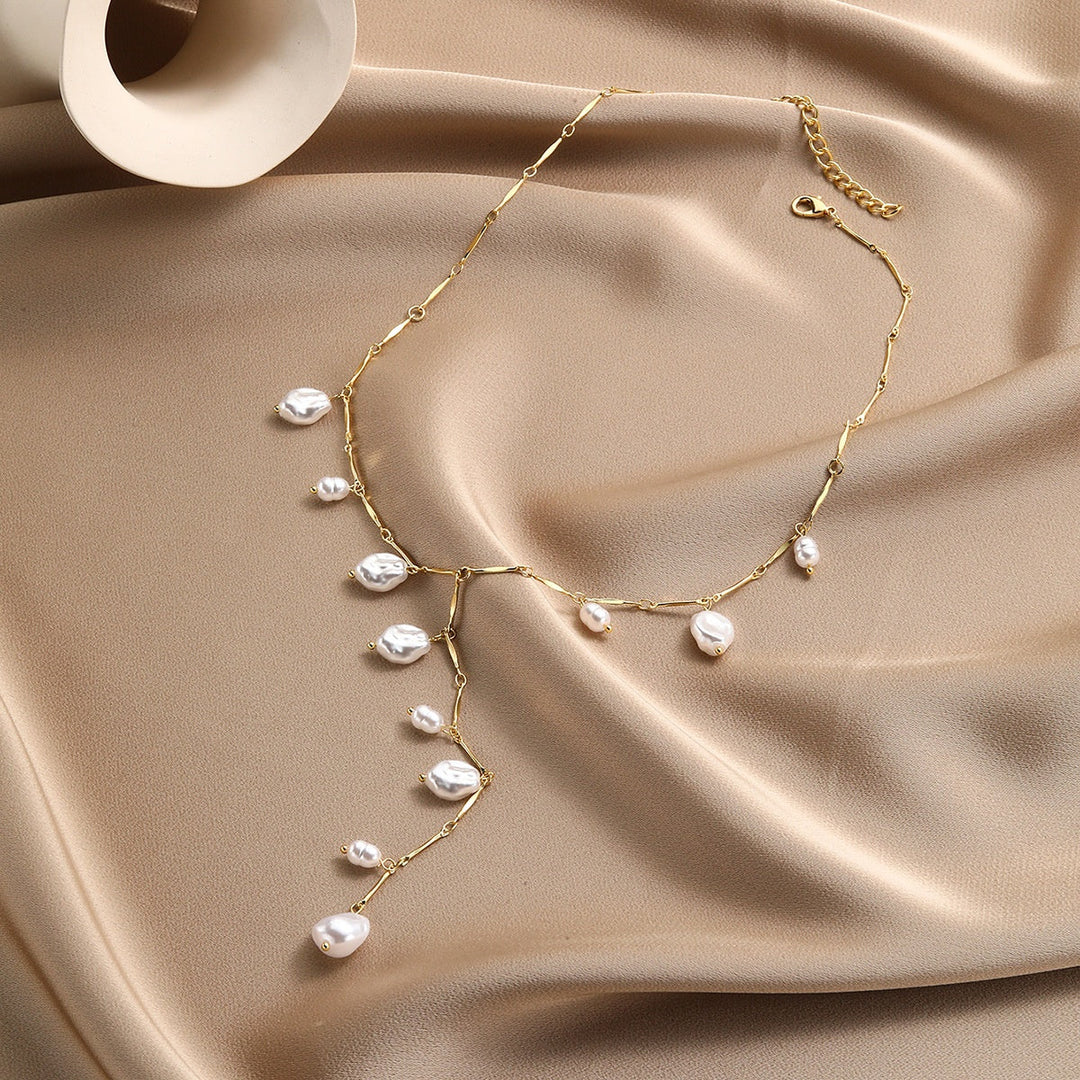 Stunning multi-strand pearl waterfall necklace for women, a delicate and elegant statement jewelry piece.