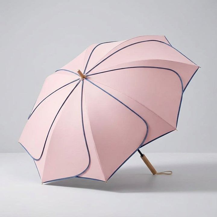 Close-up of a durable women's petal design umbrella, ideal for UV protection & elegant weather coverage.