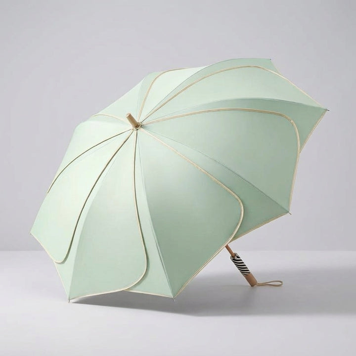 Beautiful women's umbrella, WC2026, with petal design canopy. Provides excellent UV & rain protection.