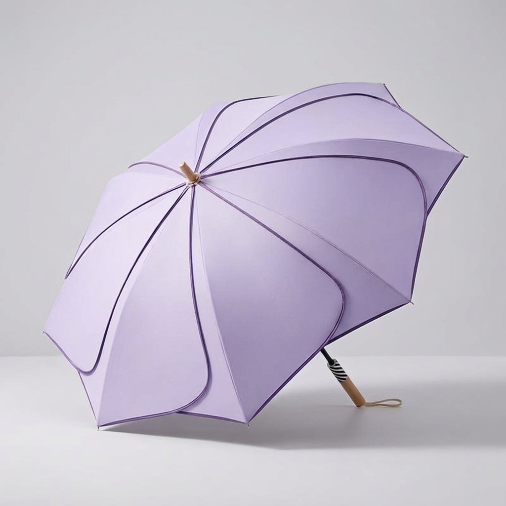 Chic women's petal-shaped UV umbrella, a durable & stylish weather accessory for sun and rain.