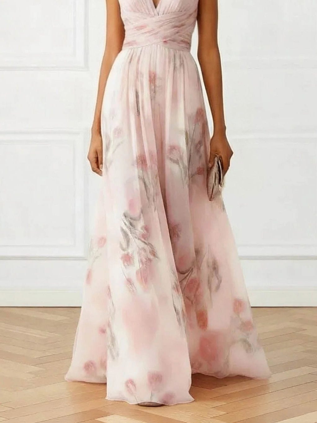 Stylish women's floral print V-neck maxi dress with an elegant flowy skirt, ideal for wedding guests.