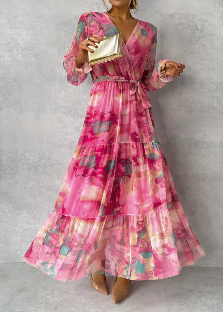Elegant women's pink floral wrap maxi dress, perfect for a wedding guest, garden party, or special spring occasion.