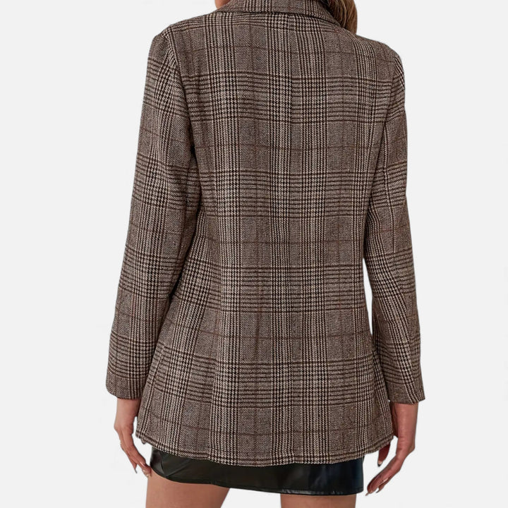 Stylish women's plaid blazer with lapels, ideal for smart casual or professional wear. A versatile fashion essential.