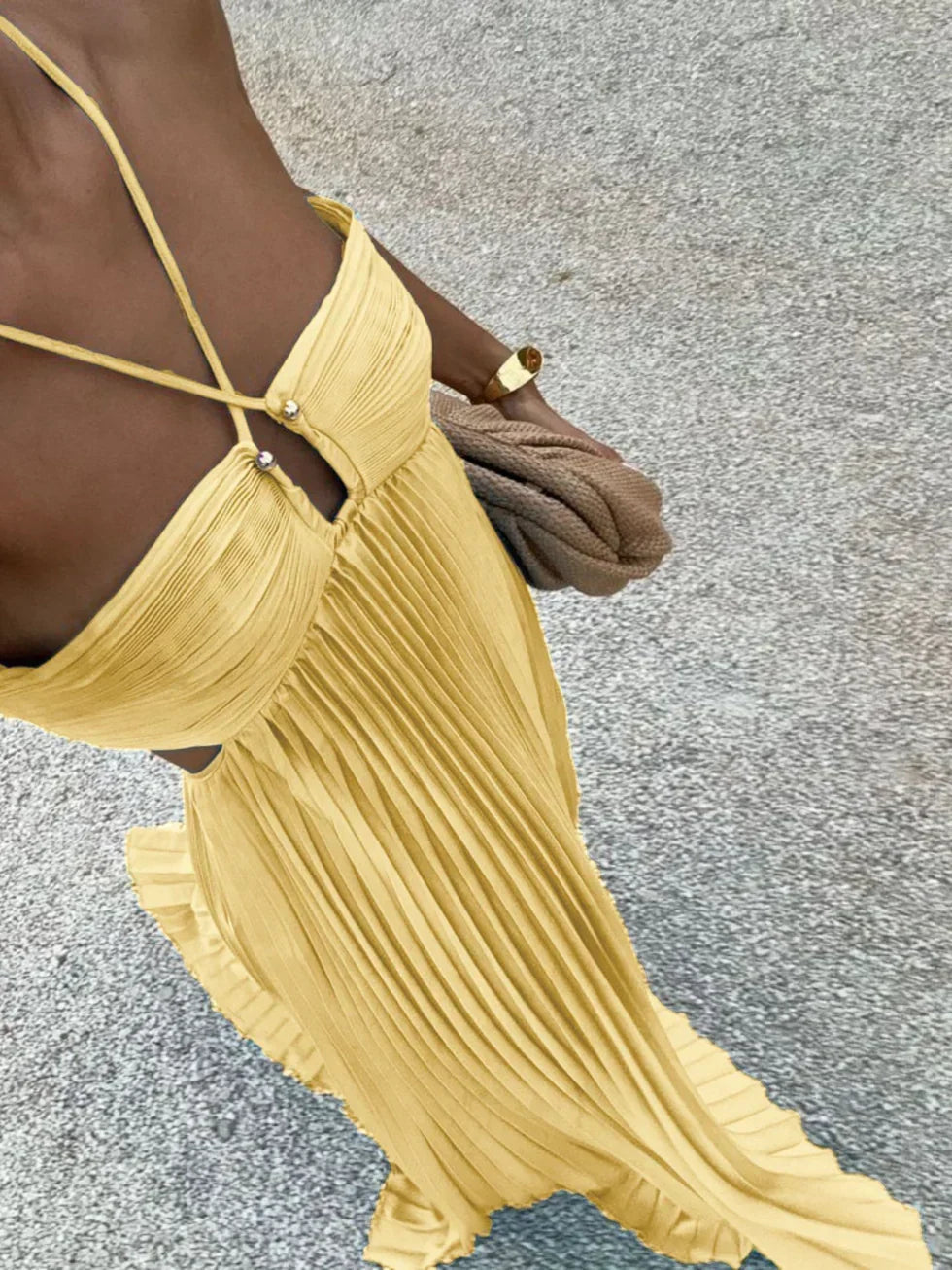 Elegant women's pleated halter maxi dress with stylish side cut-outs, perfect for summer parties & evening events.