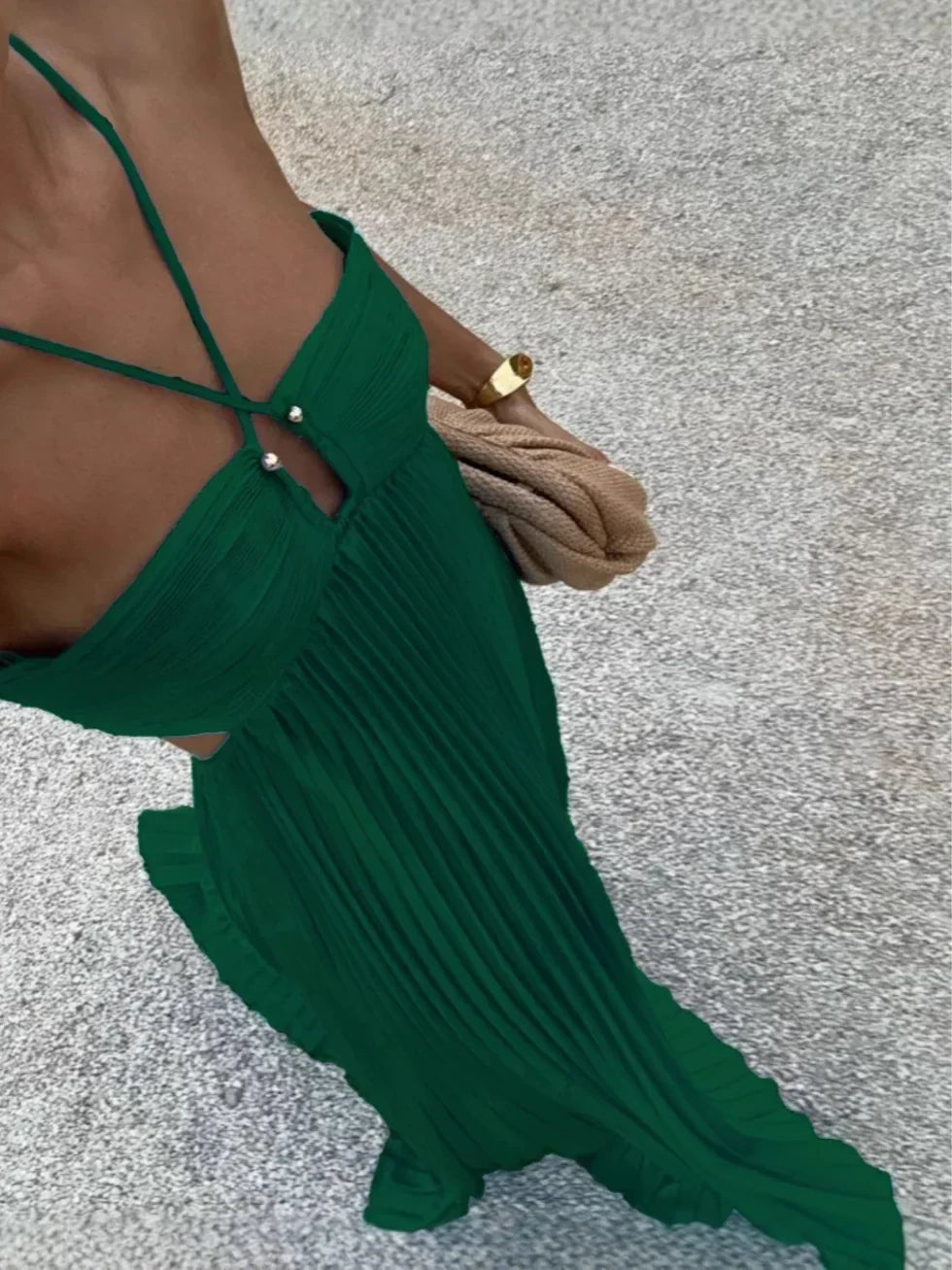 Versatile women's pleated maxi dress with halter top & side cut-outs, suitable for summer, parties & evening wear.