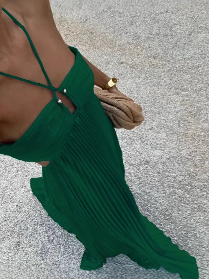 Versatile women's pleated maxi dress with halter top & side cut-outs, suitable for summer, parties & evening wear.