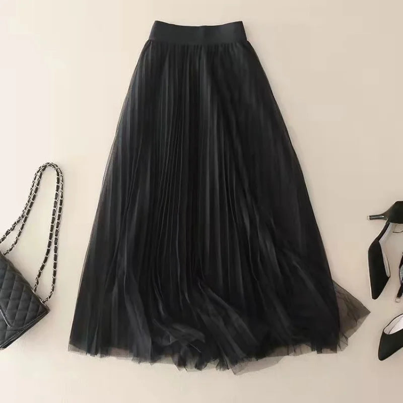 Women's high-waisted A-line midi skirt featuring elegant pleats, ideal for fashionable evening wear.