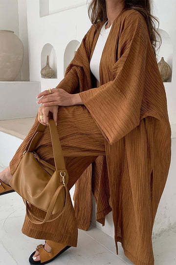 Women's elegant pleated kimono set; a versatile two-piece outfit. Comfortable and chic for spring and fall fashion.