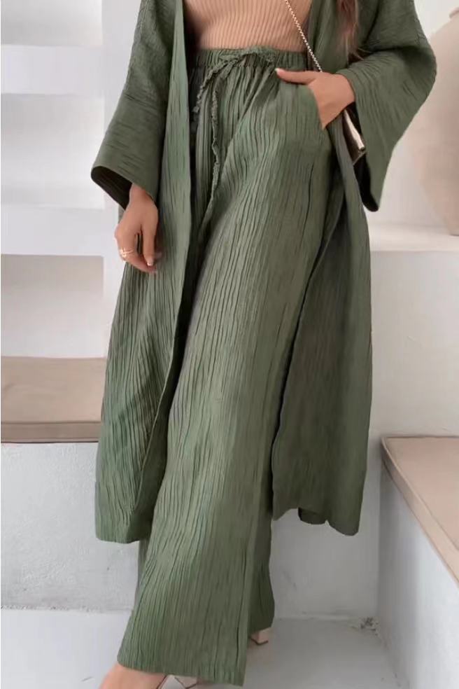Chic women's elegant pleated kimono top and pant two-piece set. Comfortable, versatile loungewear for modern women.