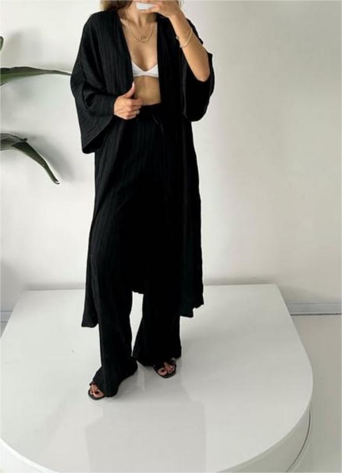 Women's elegant pleated kimono two-piece outfit. Comfortable and versatile loungewear set for stylish spring fashion.