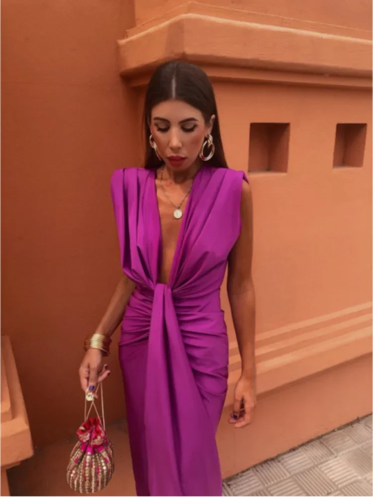 Flattering long elegant women's pleated maxi dress, designed for special occasions & formal evening events.
