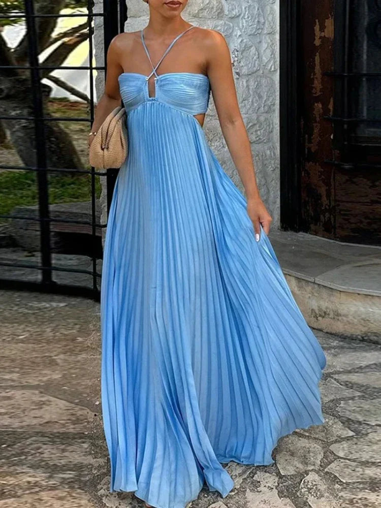 Elegant women's pleated maxi dress in a flowing fabric, perfect for formal occasions or chic summer wear.