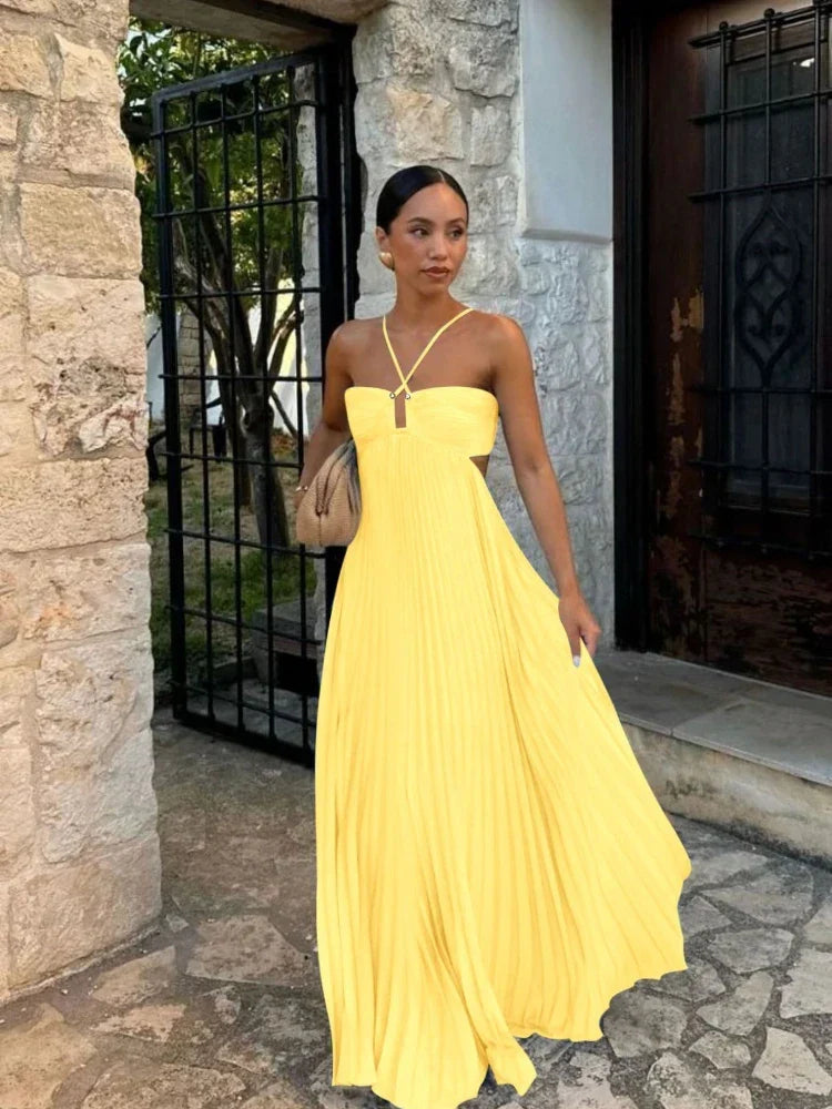 Chic flowy pleated maxi dress for women, ideal for effortless summer style, comfort, and elegant occasions.