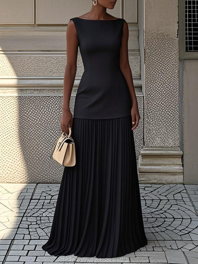 Timeless women's sleeveless pleated maxi dress, elegant formal silhouette suitable for evening events & special occasions.