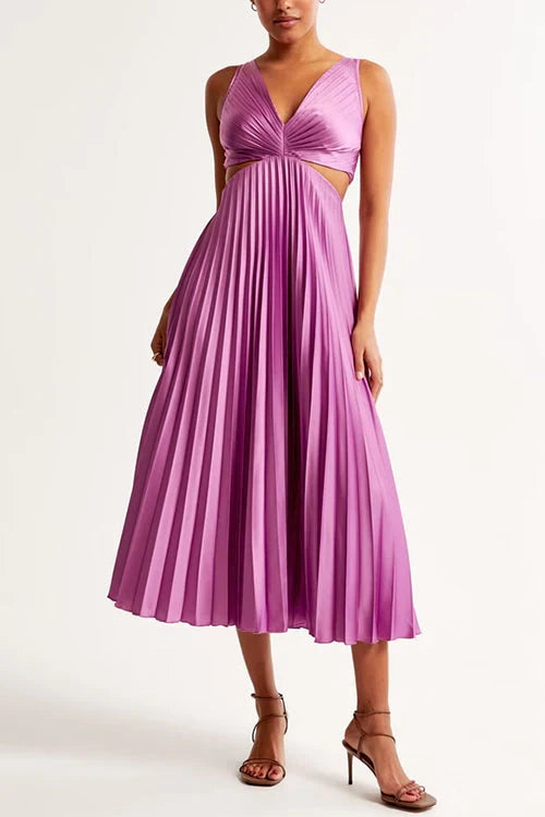 Full-length elegant women's flowy pleated maxi dress, showcasing its graceful silhouette.