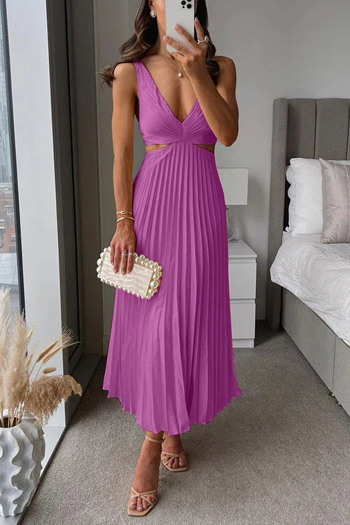 Women's elegant pleated maxi dress, highlighting its V-neck, sleeveless design, and flowy cut.