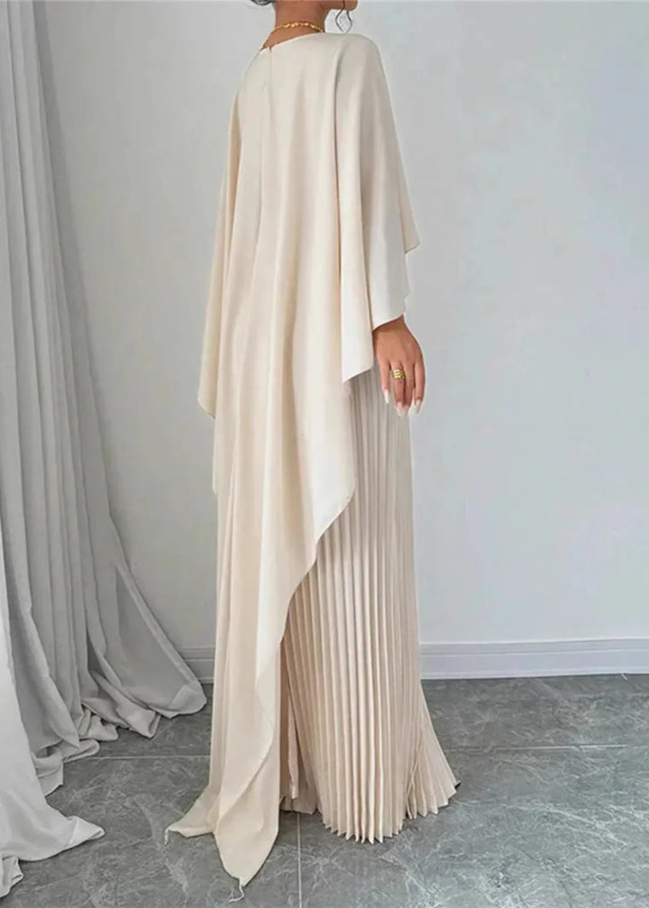 Luxurious women's flowing maxi dress. Features delicate pleats & an elegant cape overlay, perfect for evening events.