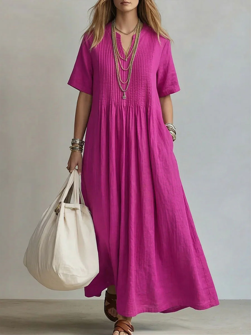 Elegant women's pleated maxi dress with V-neck, perfect for summer holidays.