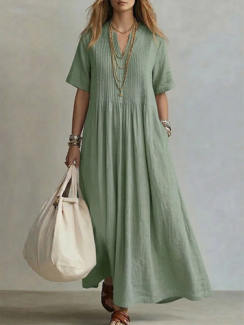 Stylish women's maxi dress, comfortable and casual with pockets, ideal for summer.