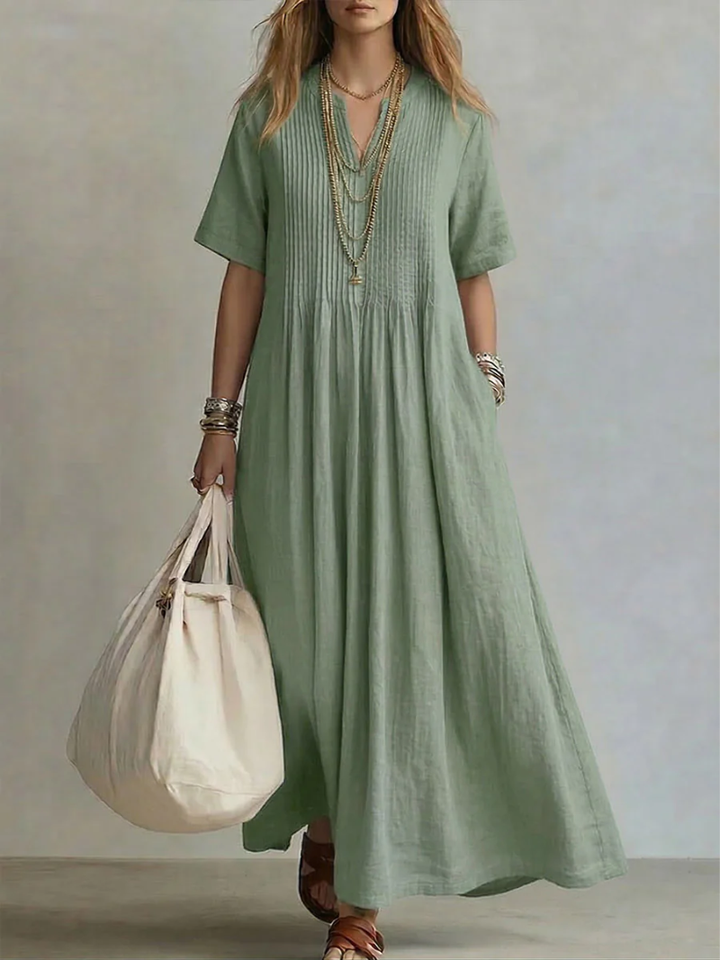 Stylish women's maxi dress, comfortable and casual with pockets, ideal for summer.