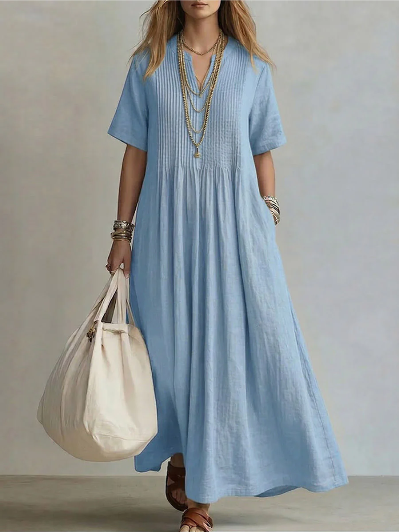 Flowy pleated V-neck maxi dress for women, elegant and perfect for a stylish summer look.