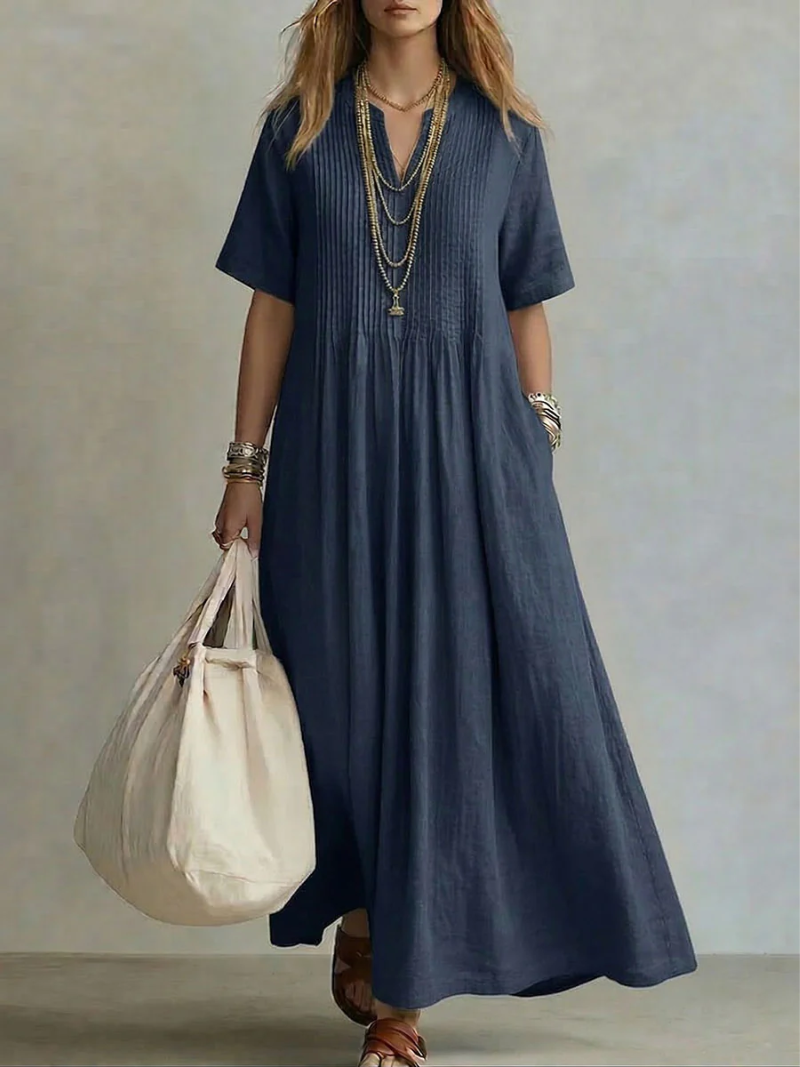 Casual yet elegant women's summer maxi dress, pleated with V-neck, perfect for everyday wear.