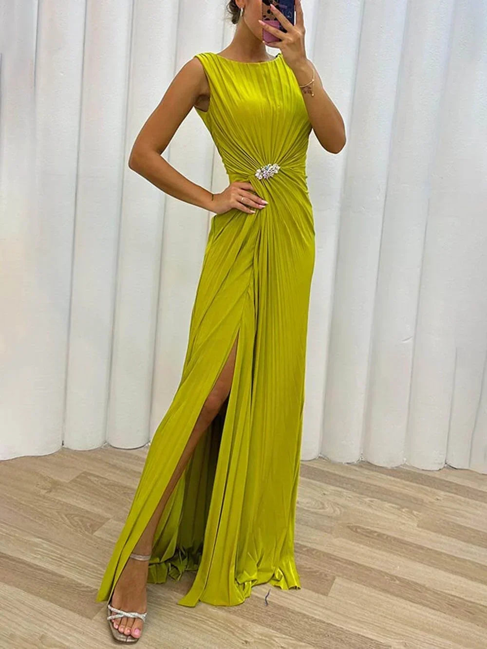 Elegant women's pleated maxi evening gown, perfect for formal events & special occasions.