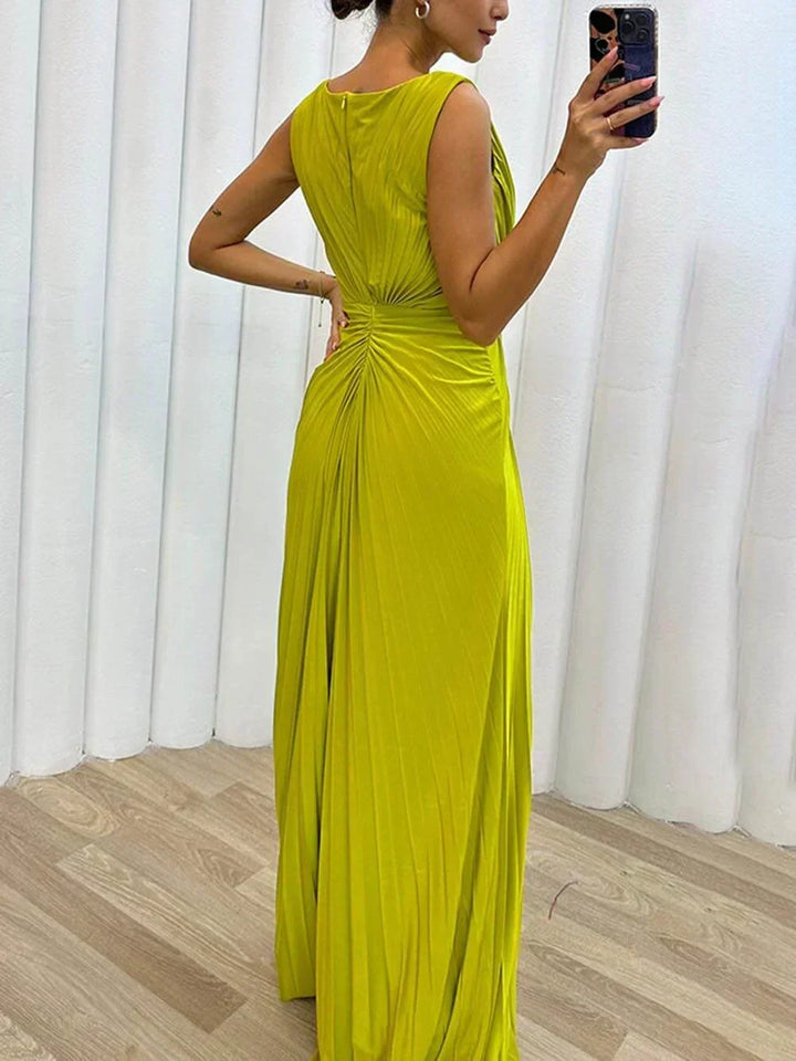 Navy blue elegant women's pleated maxi evening gown, ideal for galas & formal special occasions.
