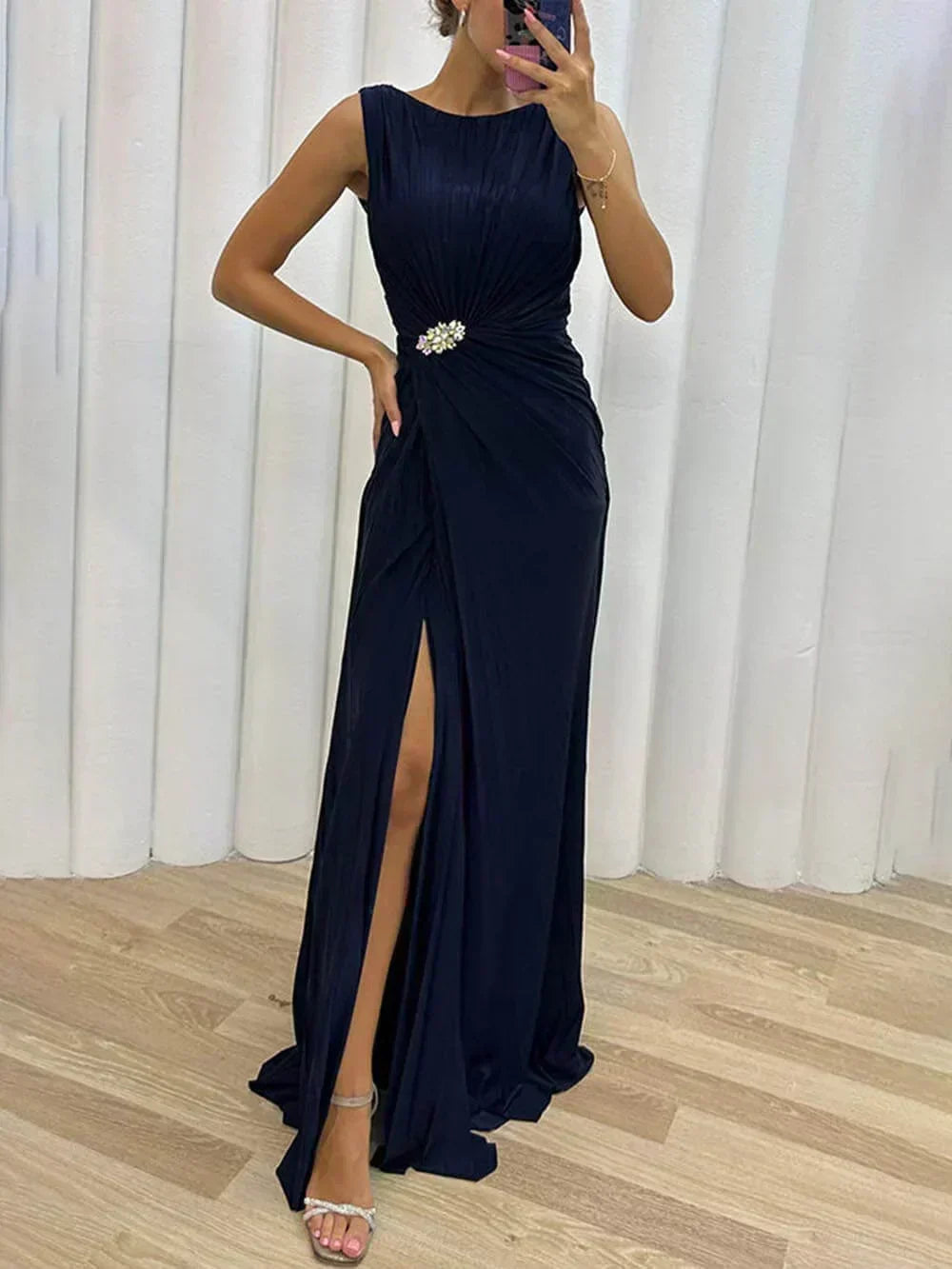 Stunning yellow pleated women's maxi evening gown with elegant design, suitable for formal events.