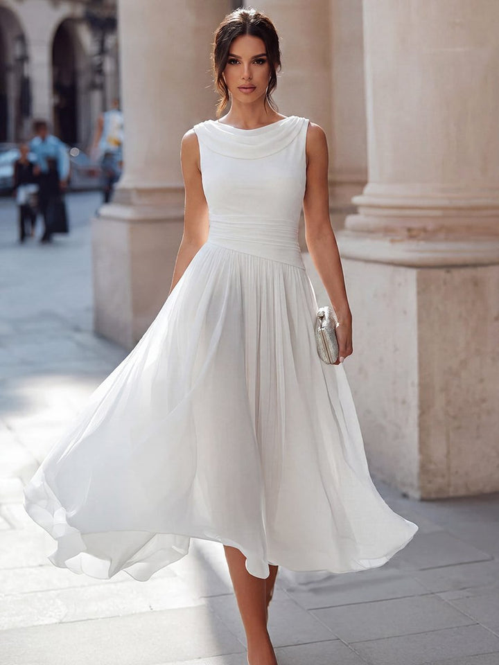 Elegant women's pleated midi dress with draped neckline, perfect for wedding guests & semi-formal events.